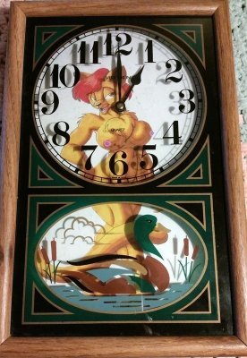 Lioness in a duck pond clock